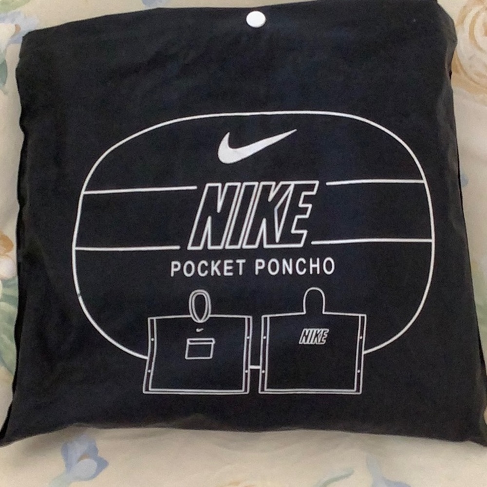 Nike Pocket Poncho Adult Rain Jacket. One Size Fits All. New, Never Used!